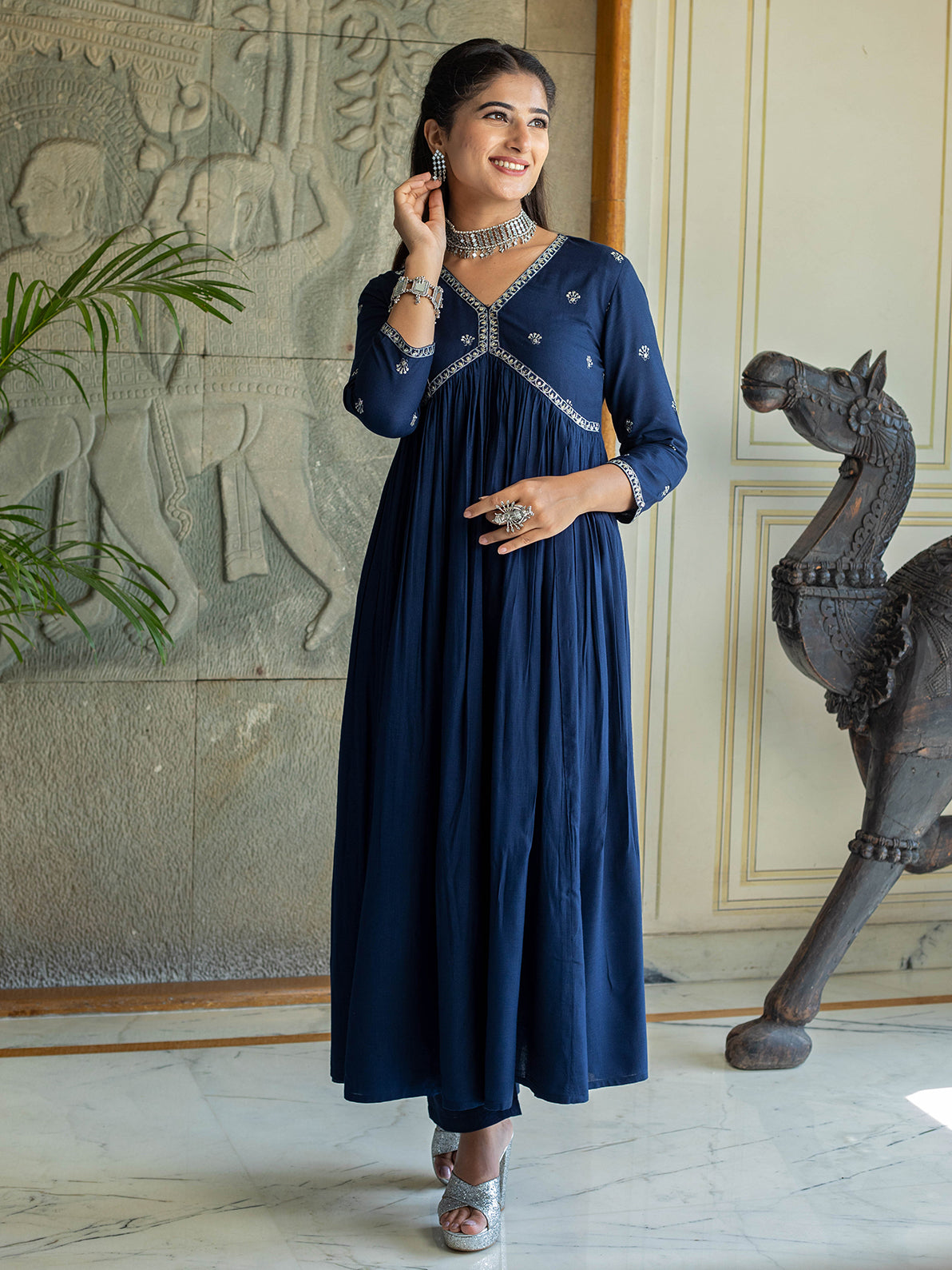 Navy embellished with floral motifs in Kurta set with White lace.